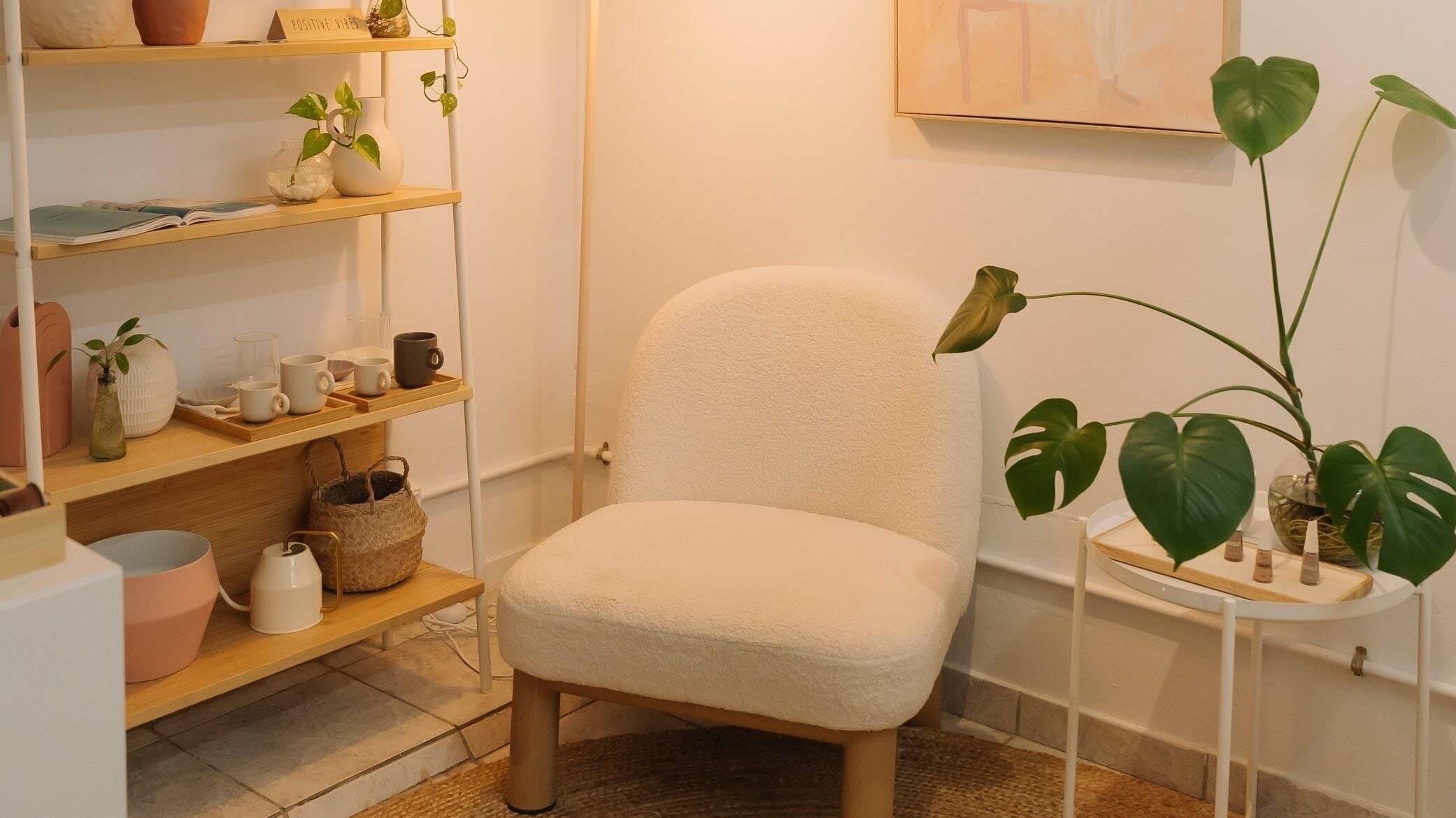 Cozy corner at Cris Nails - Manicure & Pedicure, Surfers Paradise, Queensland, AU with lush plants and soft chair.