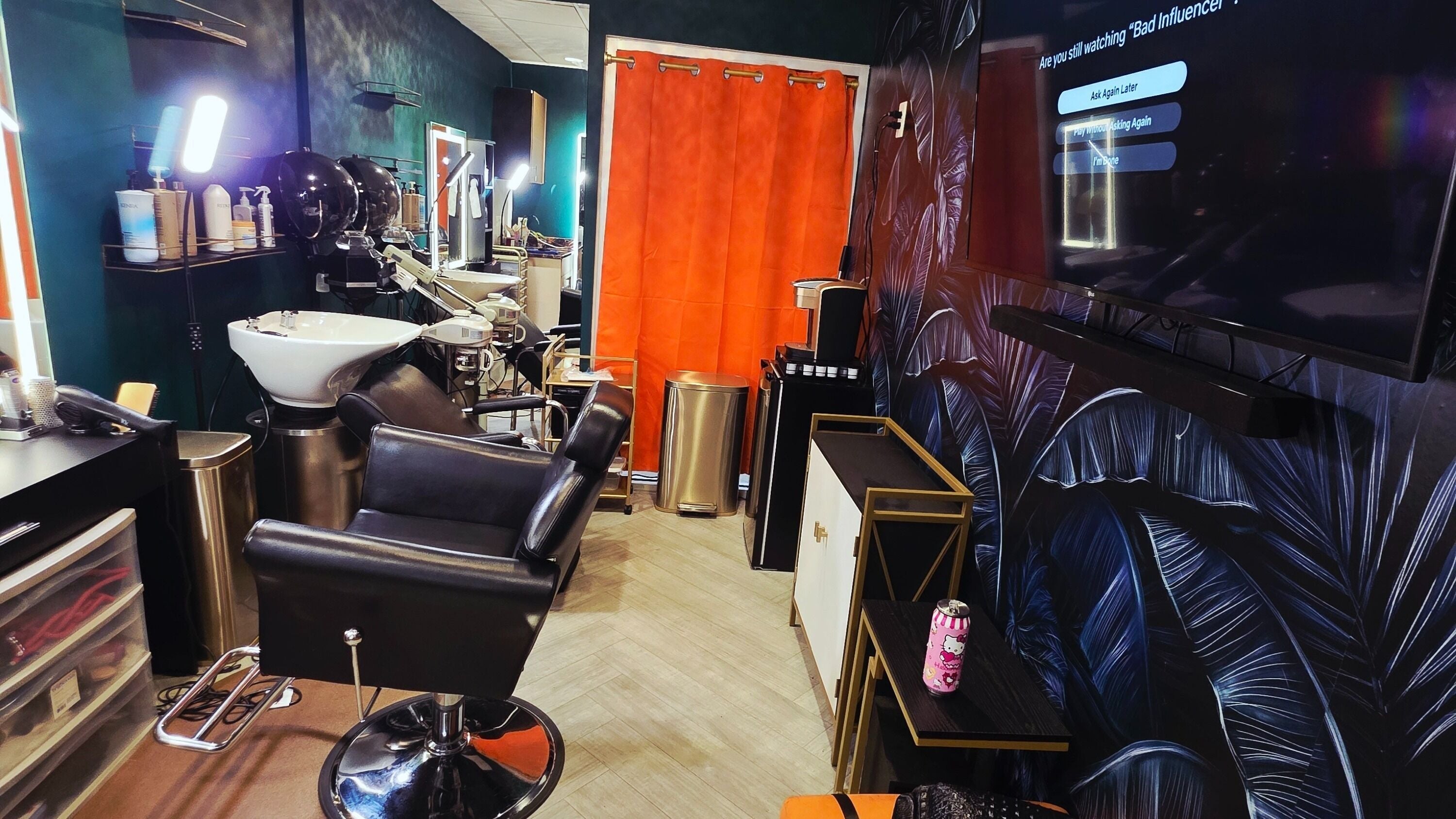 Elegant interior of Cocoa Scissorhandz Salon in Atlanta, Georgia, US featuring styling stations and modern decor.