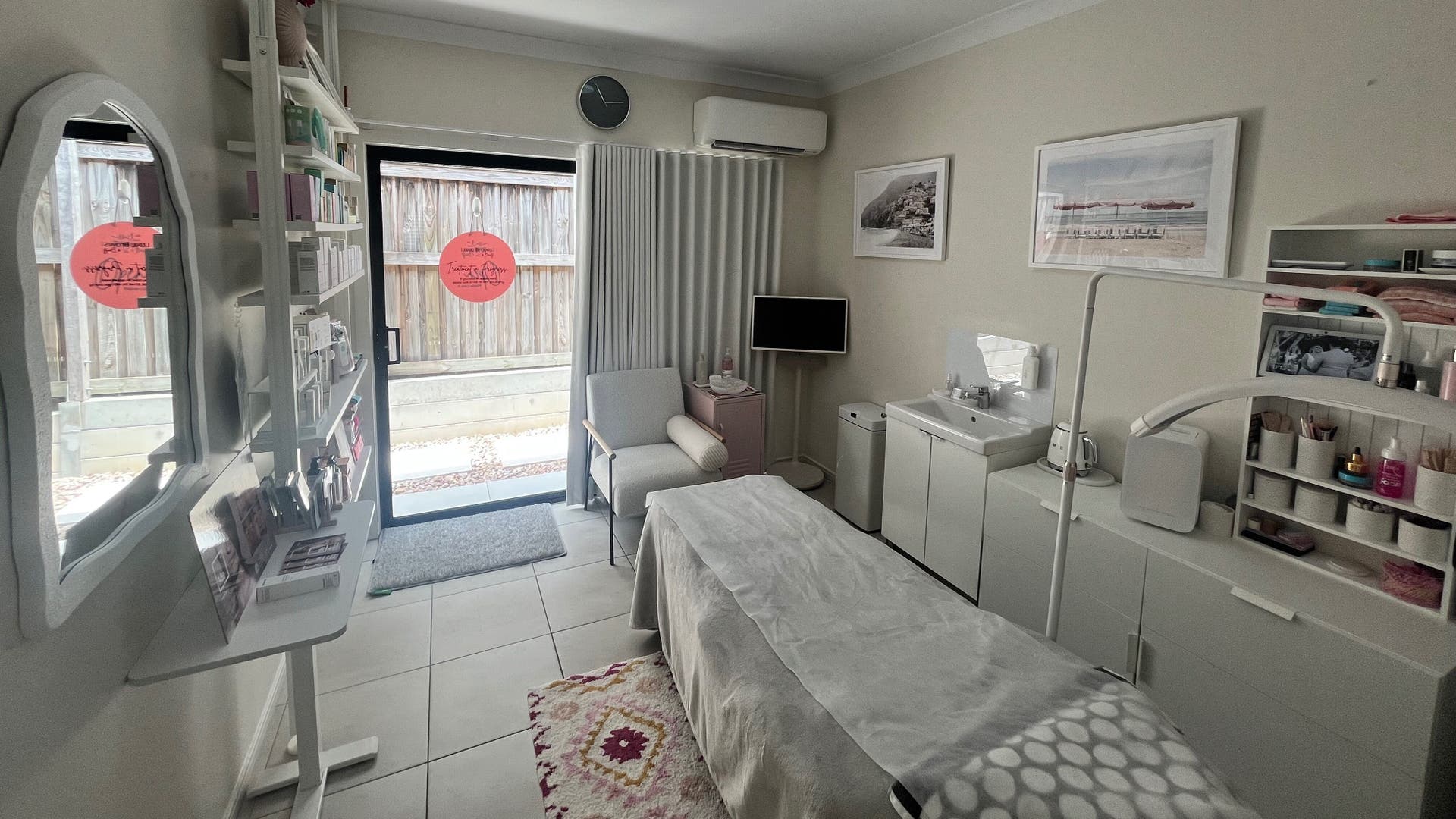 Cozy treatment room at Luxe Brows & Beauty in Brookwater, Queensland, AU with comfortable chair and beauty equipment.