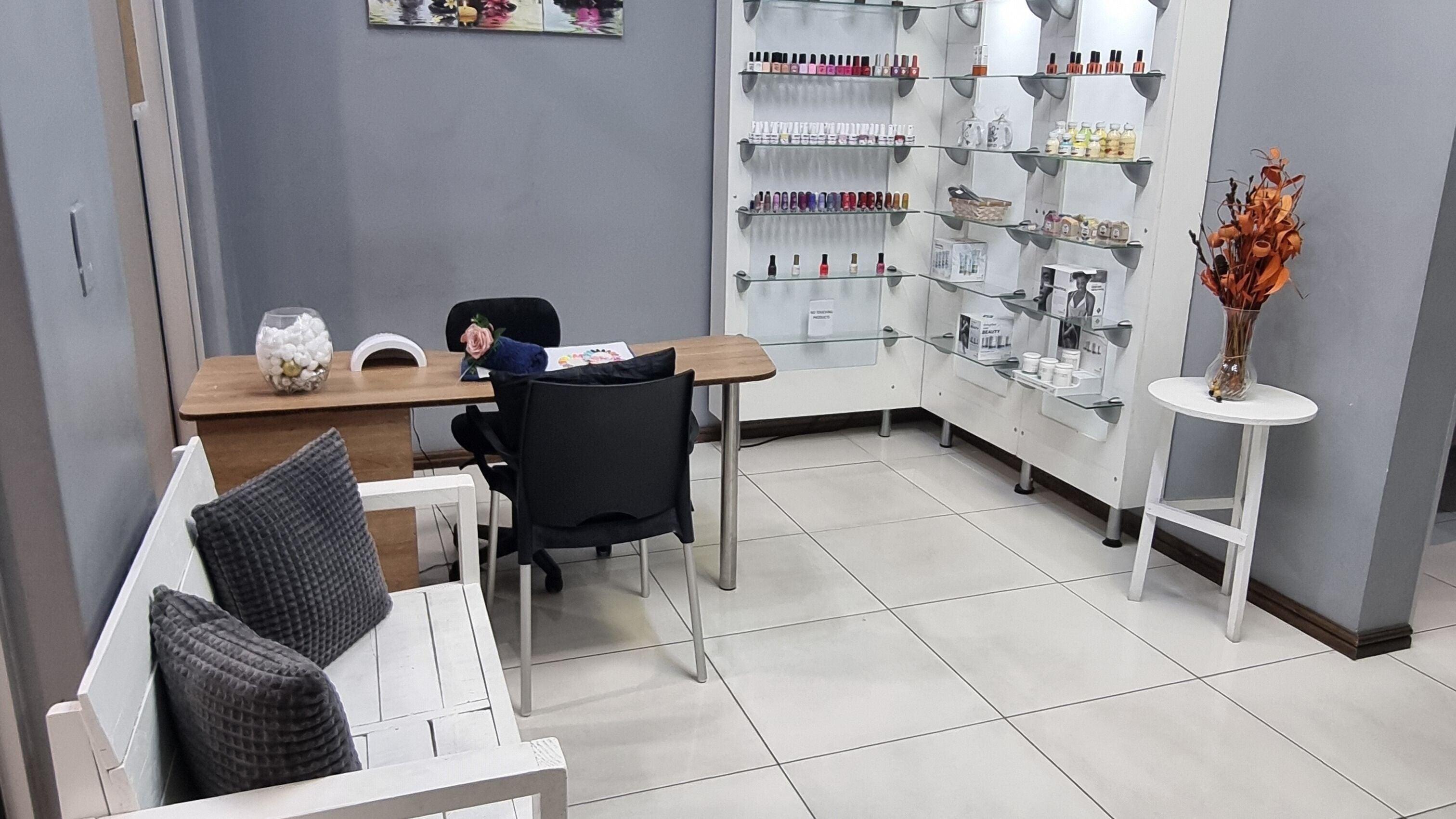 Salon Skye Beauty's modern nail area, showcasing products in Cape Town, Western Cape, ZA.