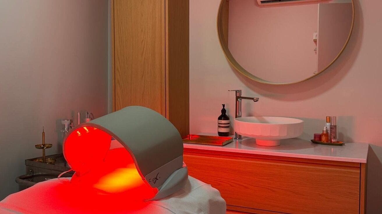 Tranquil LED therapy room at Skinrise, London, England, GB featuring advanced skincare equipment.