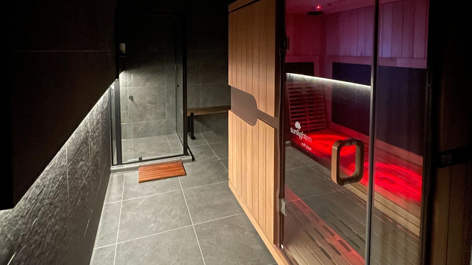Modern sauna at Cure HQ Recovery, Niddrie, Victoria, AU, offers a tranquil wellness experience.