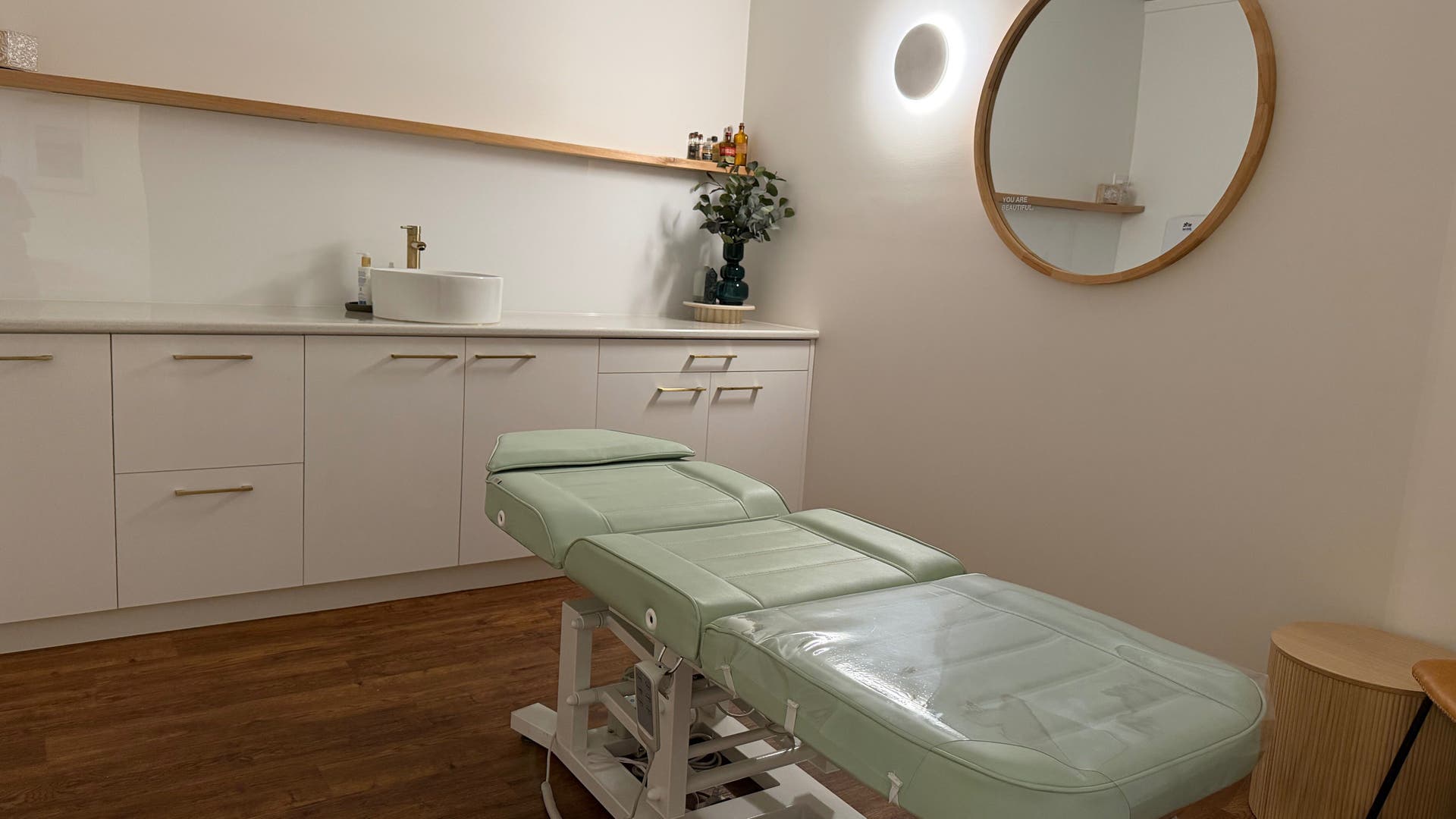 Treatment room at Nàdair Beauty, Echuca, Victoria, AU with a massage table and modern decor.