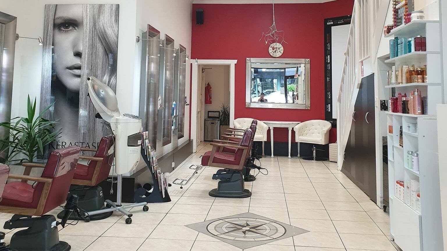 Chic interior of Hahn Beauty Hair Salon in Melbourne, Victoria, AU, showcasing salon chairs and modern decor.