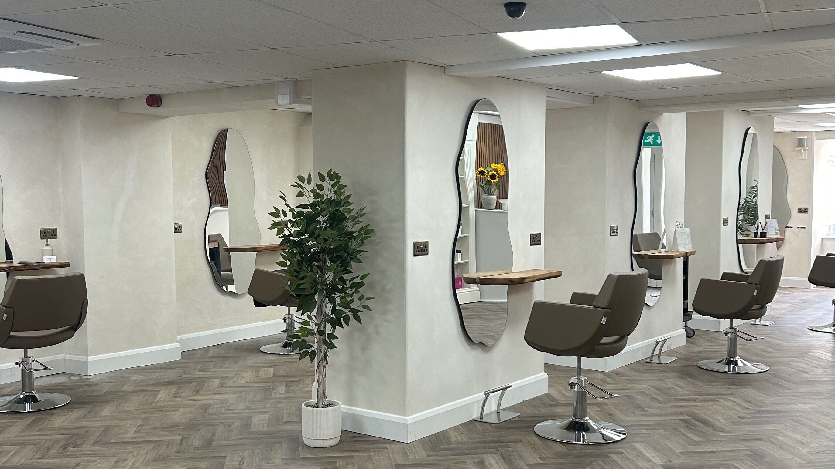 Stylish interior of Jennifer Holmes Hair and Beauty Ltd in Masham, England, GB showcasing elegant salon spaces.