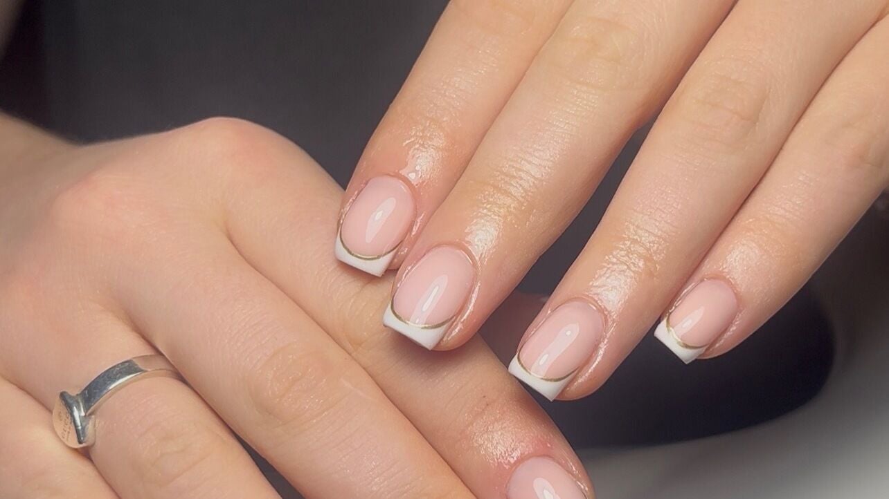Elegant French manicure at Nails By Bree, Bean, England, GB, showcasing glossy pink nails with white tips.