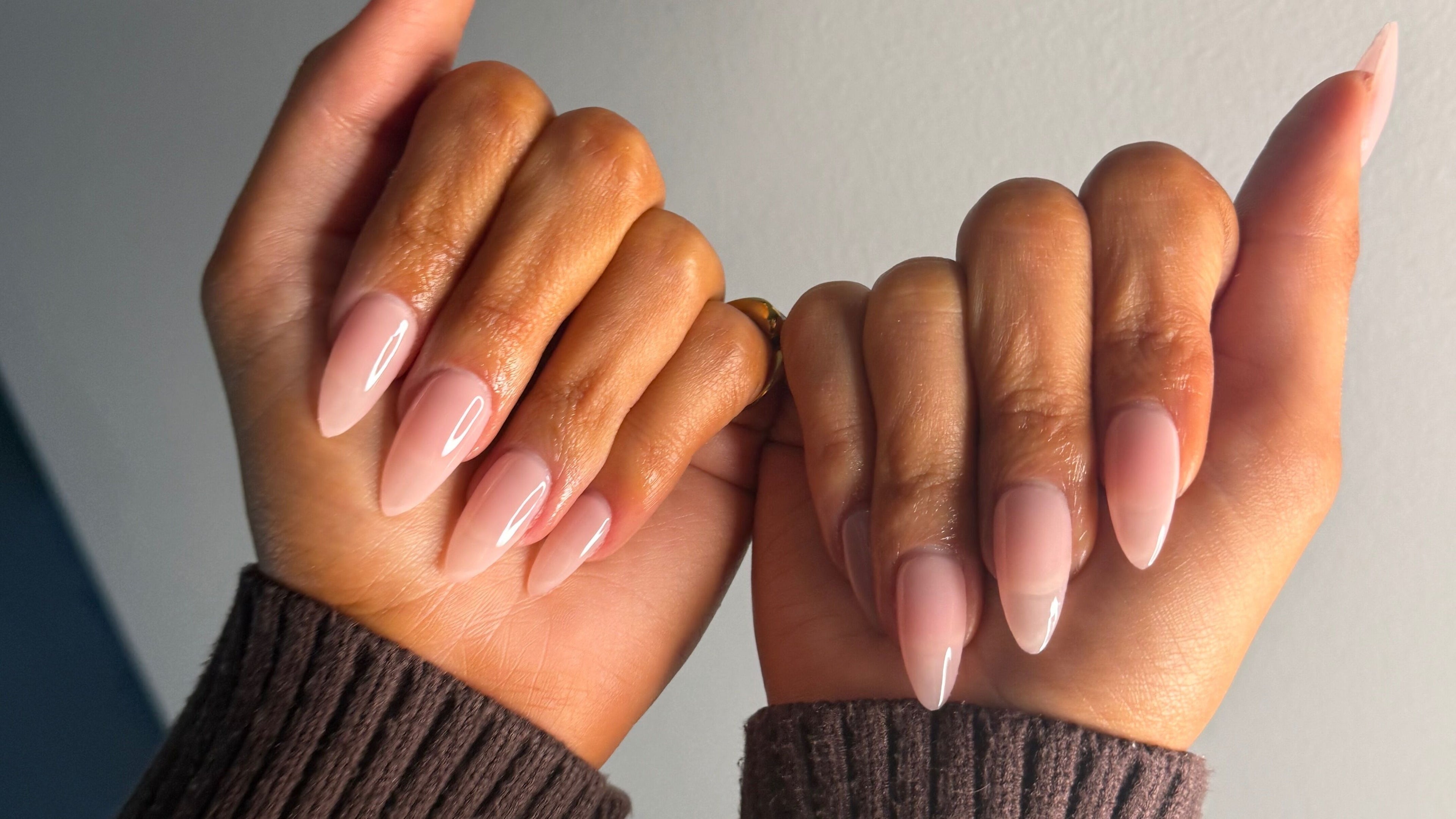 Stylish manicure with glossy nude nails at Montè Beauty, Melbourne, Victoria, AU.