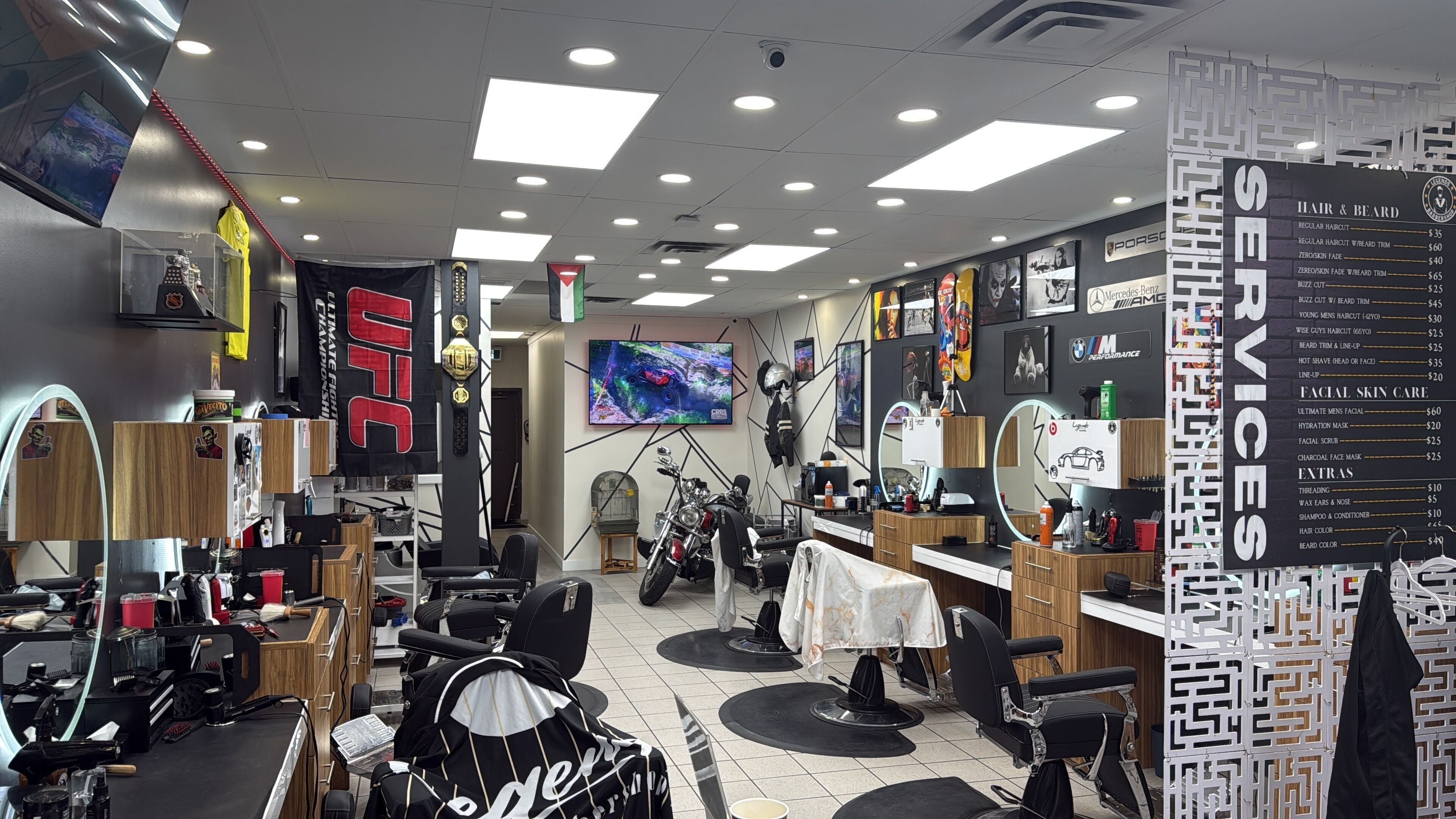 Modern interior of Legends Barbershop in Calgary, Alberta, CA showcasing premium barber chairs and decor.