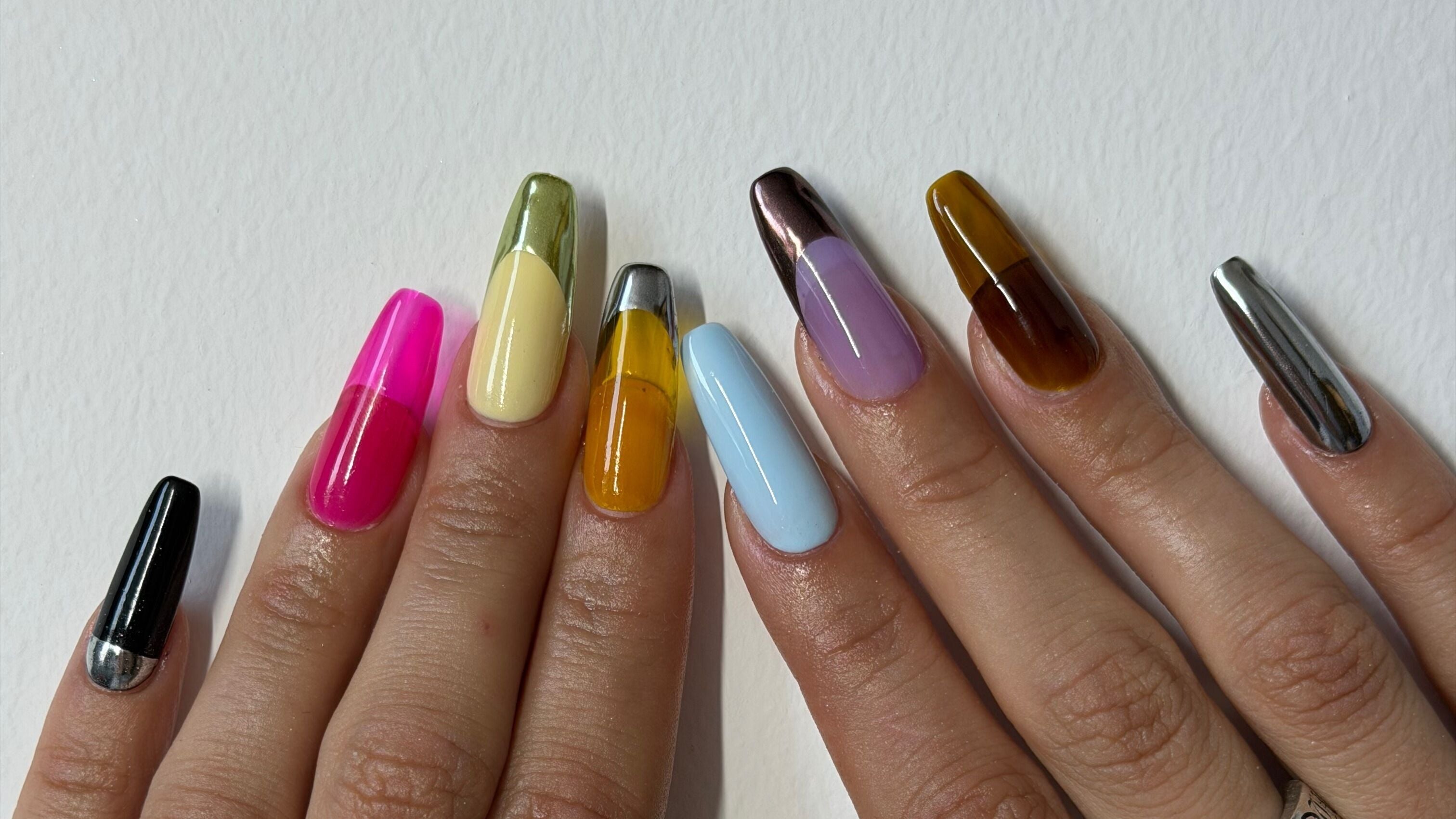Colorful nail art from Suki Nailz in London, England. A showcase of vibrant, modern designs.