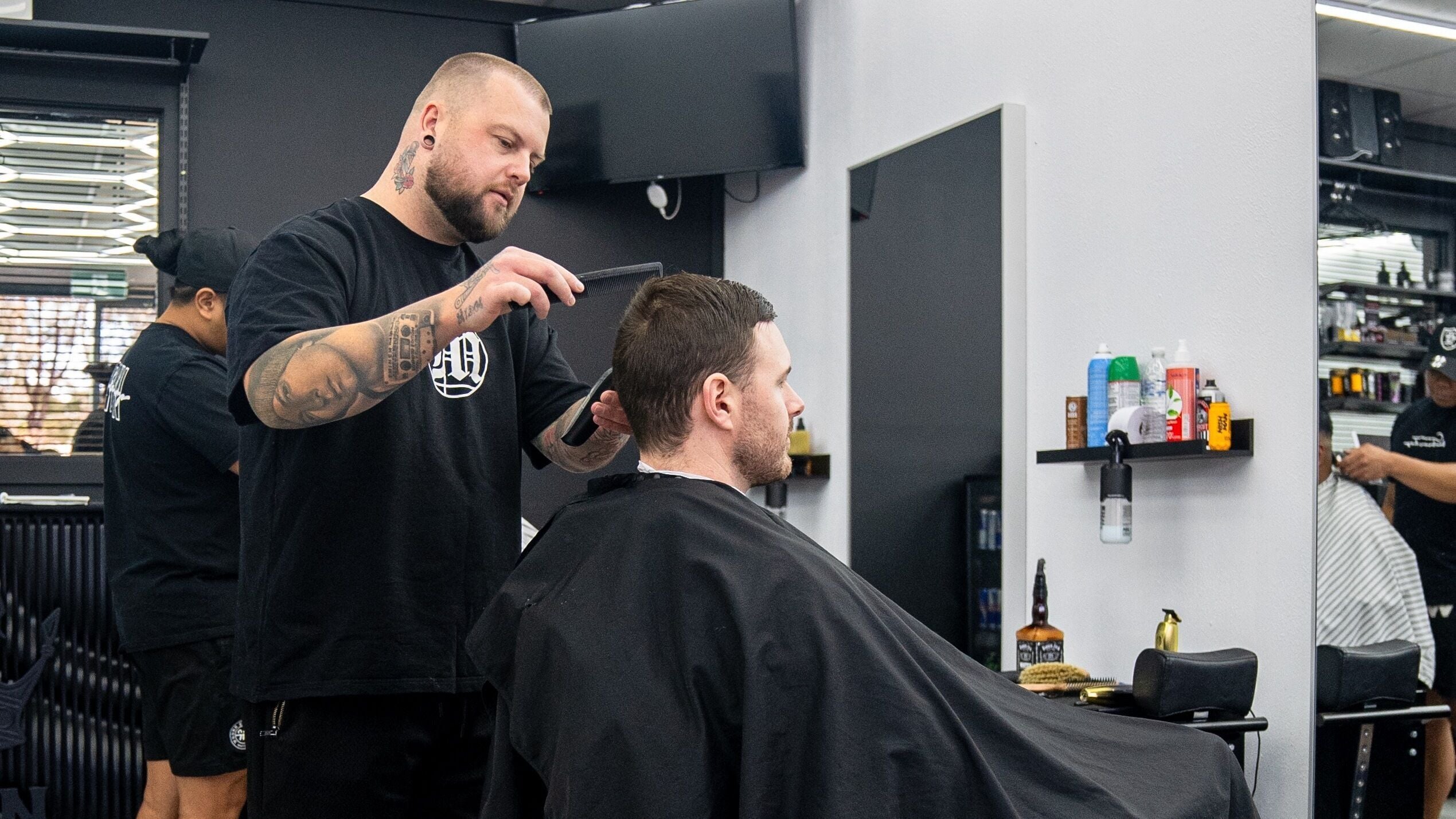 Barber crafting a stylish haircut at Studio Ninety-Four Arndell Park, Blacktown we sere, New South Wales, AU.