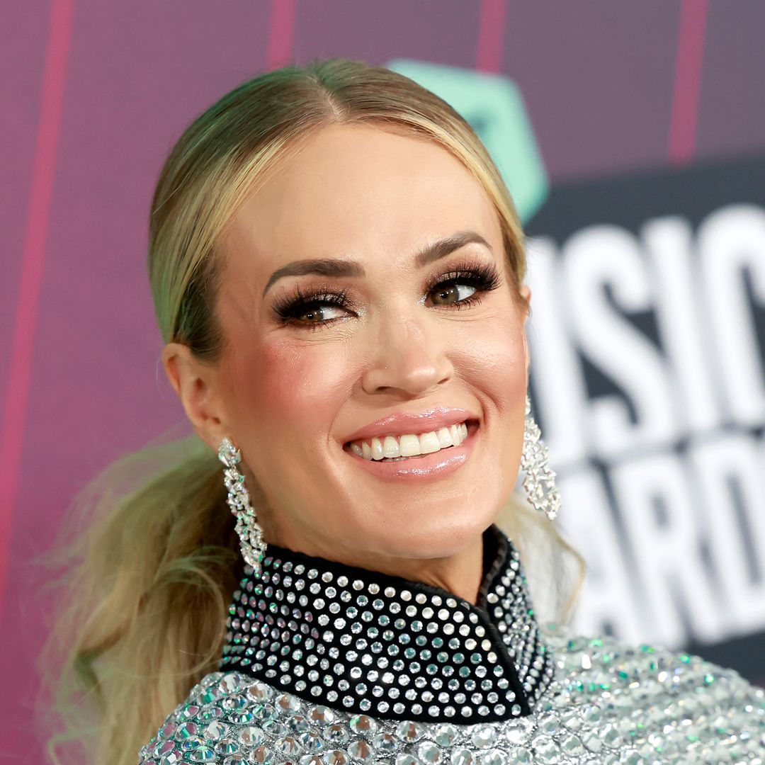 Carrie Underwood sports wild hair in tearful photo re-posted following American Idol news