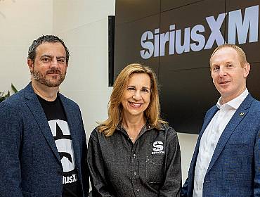 Members of SiriusXM and IDA Ireland pose at SiriusXM headquarters.