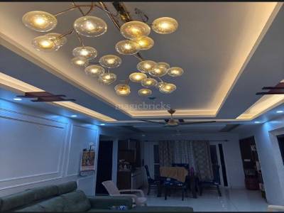 The bedroom features a bed, headboard, and decorative pillows at Sai Purvi Symphony, Gunjur Village, Bangalore The bedroom features a bed, headboard, and decorative pillows at Sai Purvi Symphony, Gunjur Village, Bangalore