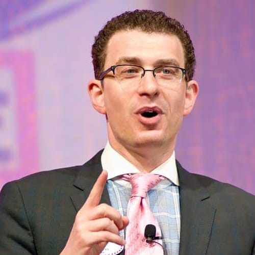 Josh Levs speaking to a group at a conference