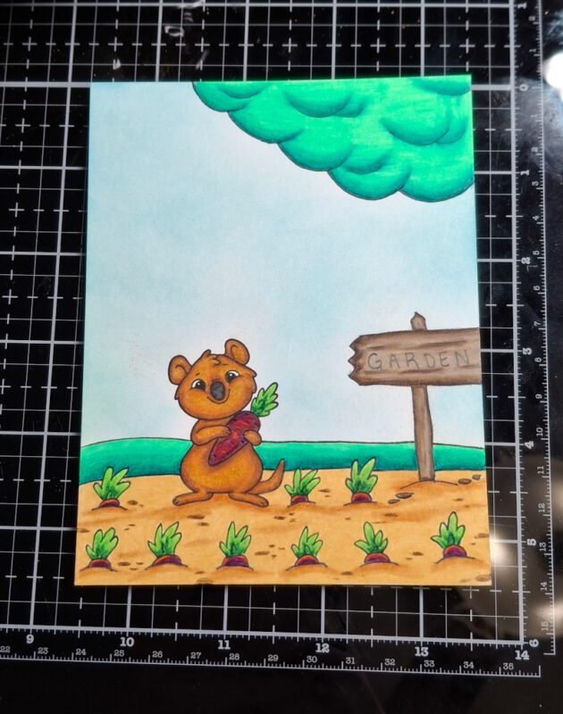 The scene has been colored using Prismacolor colored pencils.