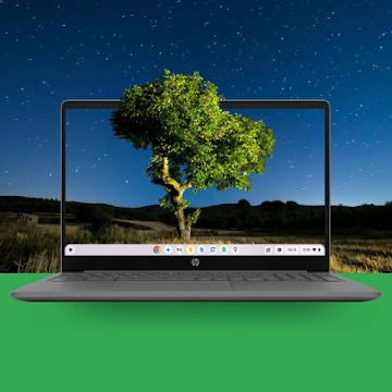 Chromebook over a landscape background simulating it coming out of the screen