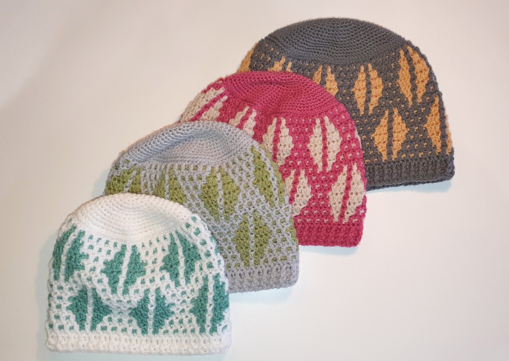 This image has an empty alt attribute; its file name is 4-hats-diagonally.jpg