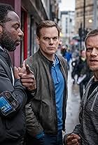 Michael C. Hall, Marc Warren, and Gabriel Paul in Safe (2018)