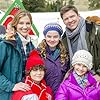 Marc Blucas, Tricia Helfer, Megan Charpentier, Jaeda Lily Miller, and Benjamin Wosk in Operation Christmas (2016)