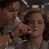 Jennifer Jason Leigh and Bruce Campbell in The Hudsucker Proxy (1994)