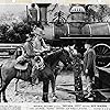 Roy Rogers, Joseph Crehan, George 'Gabby' Hayes, and Trigger in Nevada City (1941)