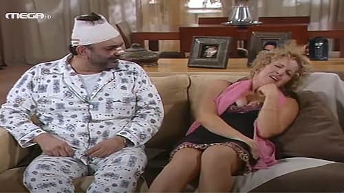 Sakis Boulas and Maria Androutsou in Episode #1.5 (2003)