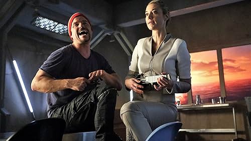 Anthony Lemke and Zoie Palmer in Dark Matter (2015)