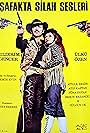 Yildirim Gencer and Ülkü Özen in Safakta Silah Sesleri (1973)