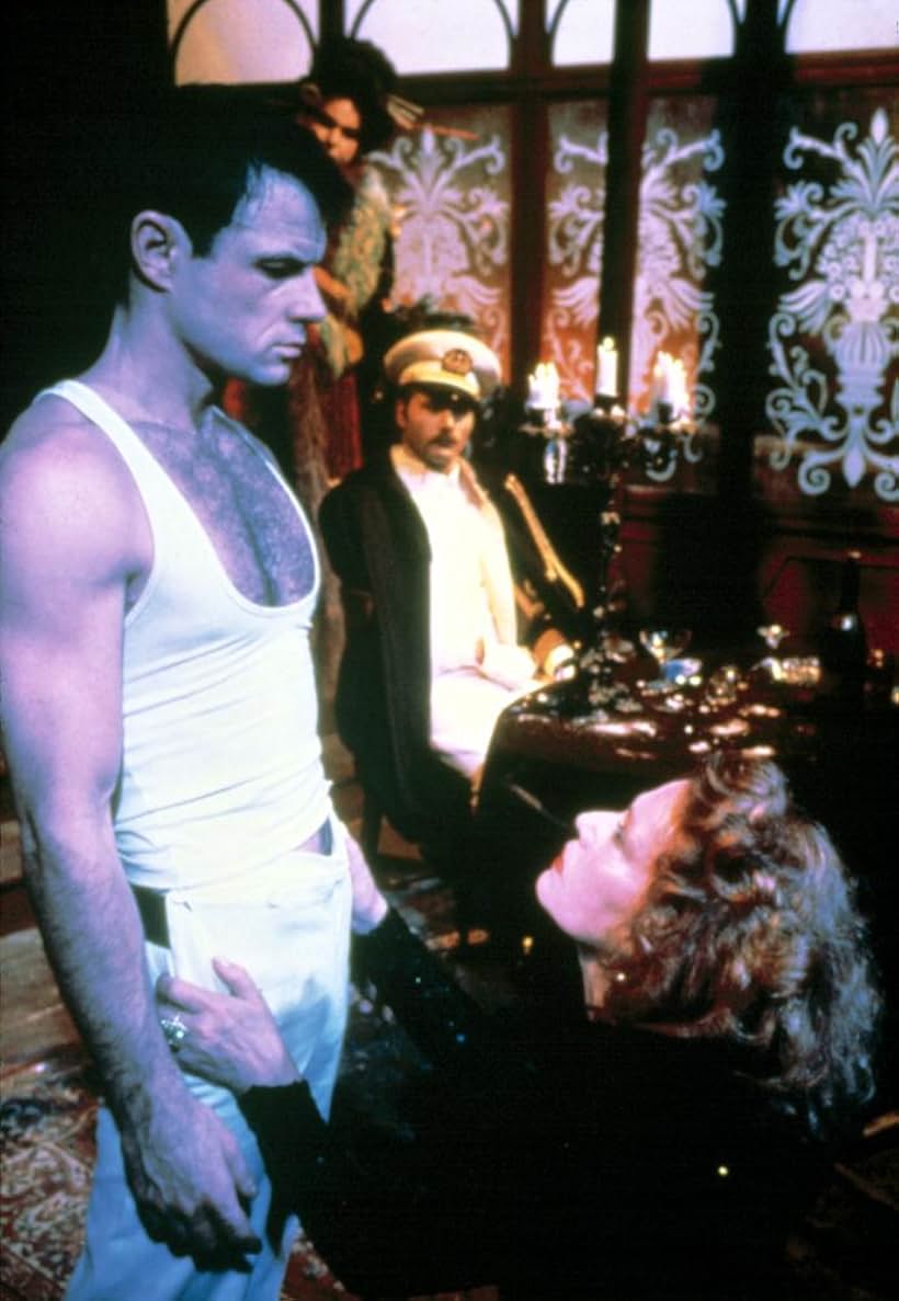 Brad Davis, Jeanne Moreau, and Franco Nero in Querelle (1982)