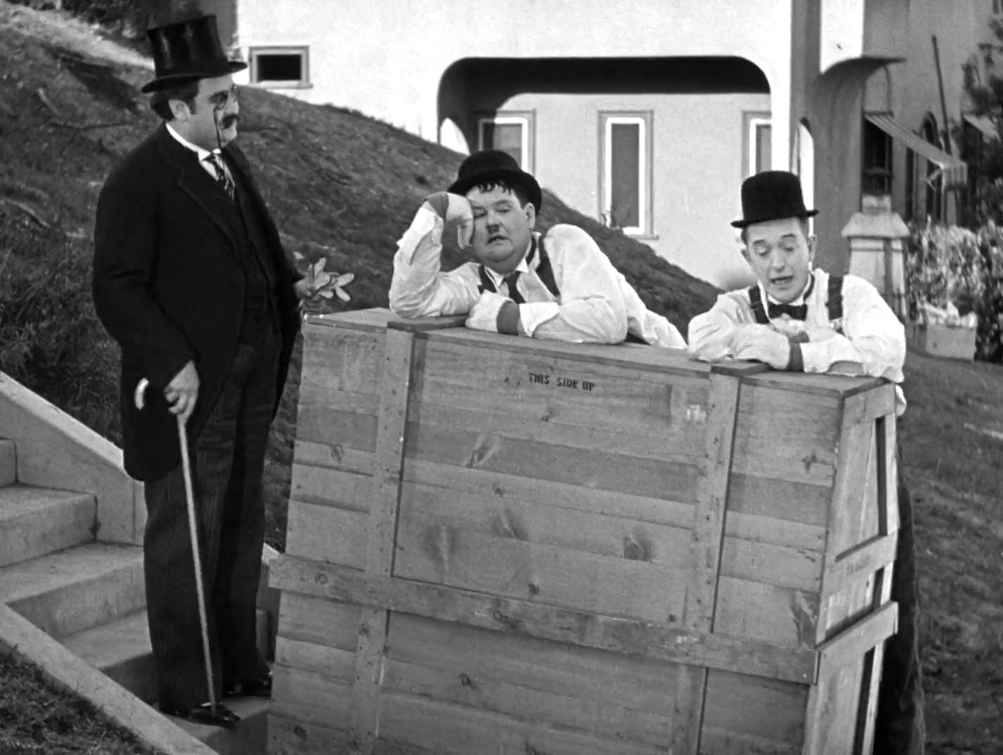 Oliver Hardy, Billy Gilbert, and Stan Laurel in The Music Box (1932)