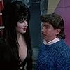 Cassandra Peterson and Mario Celario in Elvira: Mistress of the Dark (1988)