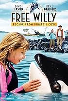 Beau Bridges, Bindi Irwin, and Siyabulela Ramba in Sauvez Willy 4 - Le repère des pirates (2010)