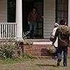 Ron Livingston and Shannon Kook in The Conjuring (2013)