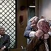 George Kennedy and Richard Griffiths in The Naked Gun 2½: The Smell of Fear (1991)