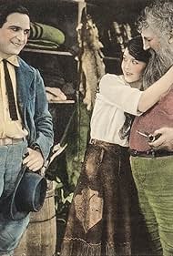 Elmer Dewey, Fritzi Ridgeway, and Earle Williams in Bring Him In (1921)