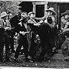 Richard Alexander, Jean Carmen, William Desmond, Earl Dwire, Julian Rivero, and Tom Tyler in Born to Battle (1935)