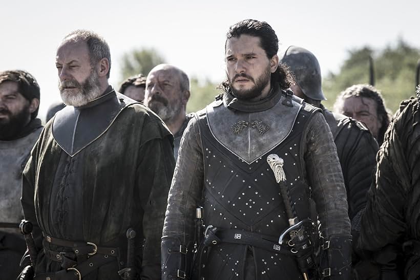 Liam Cunningham and Kit Harington in Game of Thrones (2011)