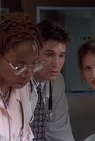 Noah Wyle, Conni Marie Brazelton, and Sherry Stringfield in ER (1994)