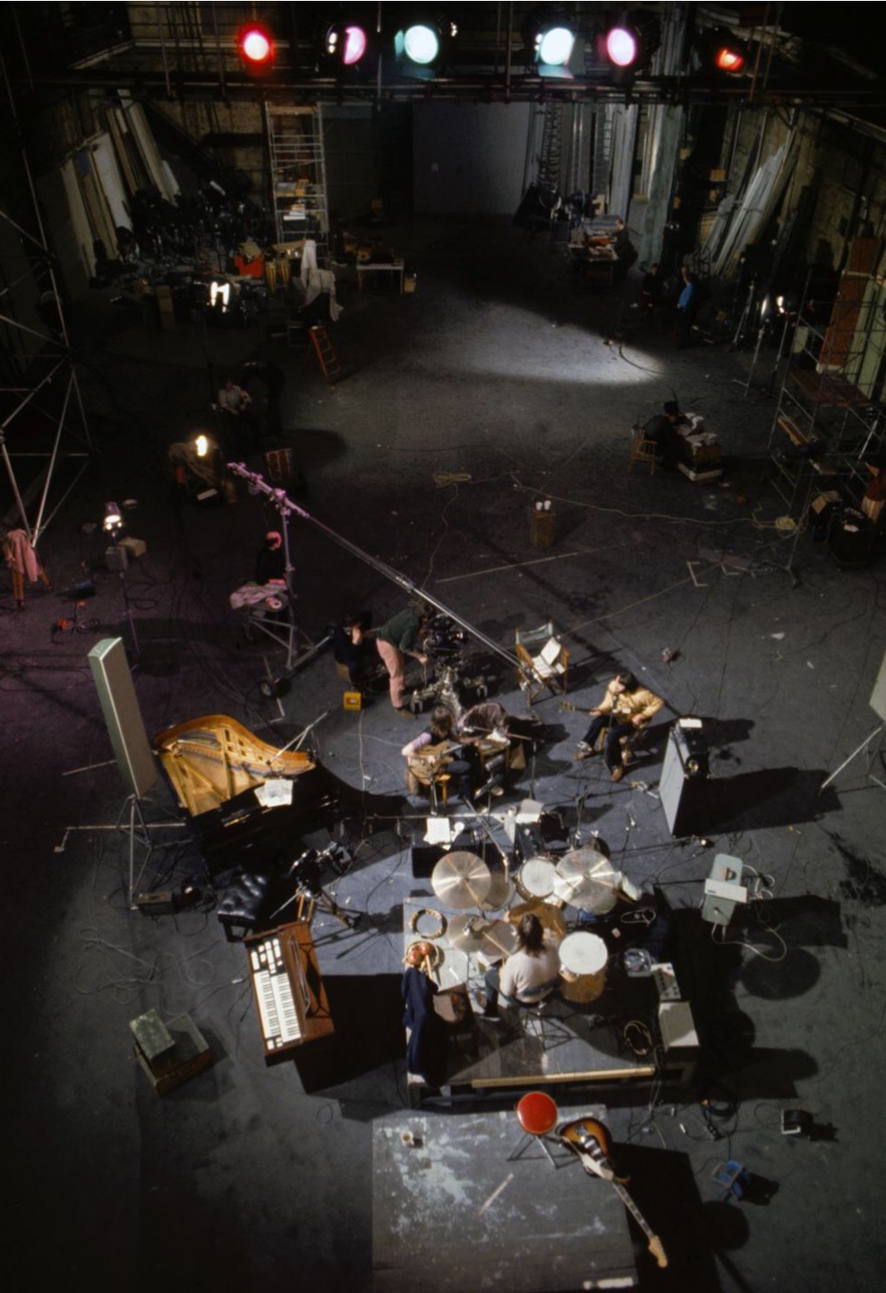 Paul McCartney, John Lennon, George Harrison, Michael Lindsay-Hogg, Ringo Starr, and The Beatles in Let It Be (1970)