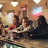 Mark Wahlberg, André 3000, Tyrese Gibson, and Garrett Hedlund in Four Brothers (2005)