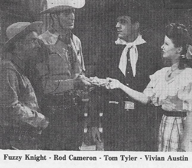 Vivian Austin, Rod Cameron, Fuzzy Knight, and Tom Tyler in Boss of Boomtown (1944)