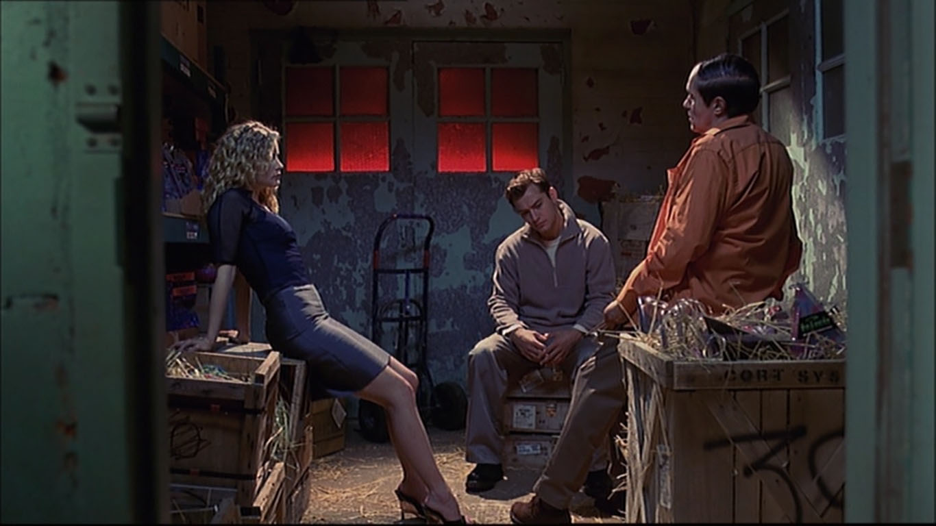 Jude Law, Jennifer Jason Leigh, and Robert A. Silverman in eXistenZ (1999)