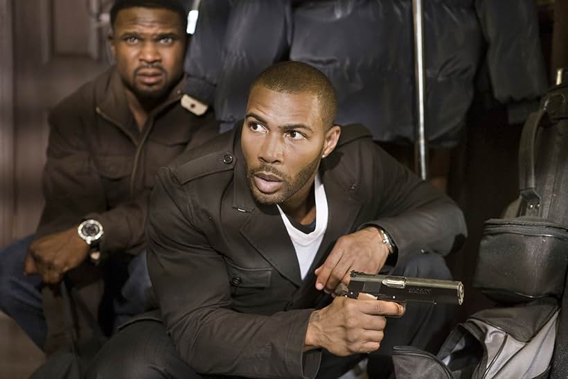 Darius McCrary and Omari Hardwick in Next Day Air (2009)