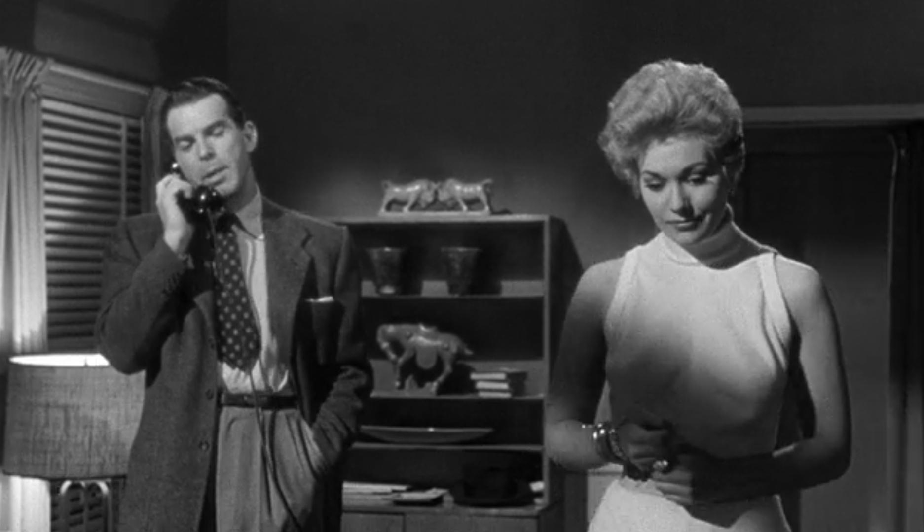 Kim Novak and Fred MacMurray in Pushover (1954)