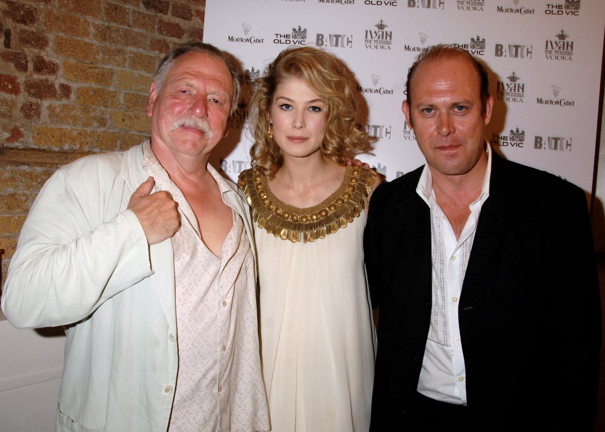 Kenneth Cranham, Rosamund Pike, and Andrew Woodall