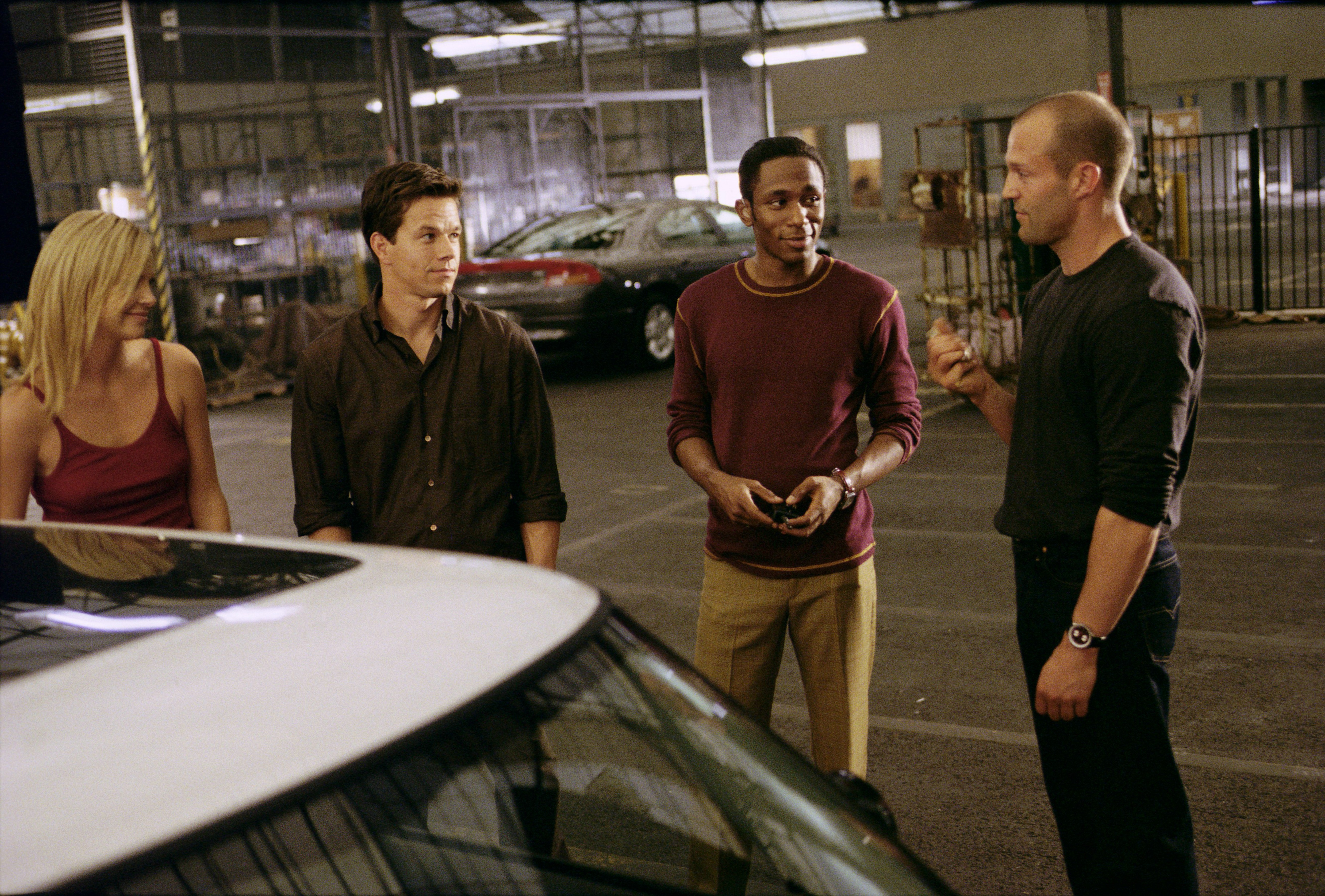 Charlize Theron, Mark Wahlberg, Jason Statham, and Yasiin Bey in The Italian Job (2003)