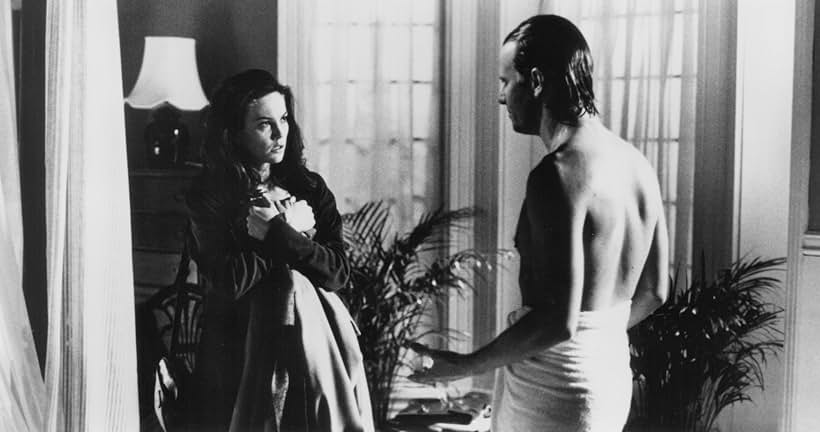 Diane Lane and Christopher Lambert in Knight Moves (1992)