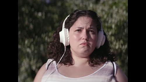 An overweight teen is bullied by a clique of cool girls poolside while holidaying in her village. The long walk home will change the rest of her life.