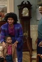 Bill Cosby, Keshia Knight Pulliam, and Phylicia Rashad in The Cosby Show (1984)