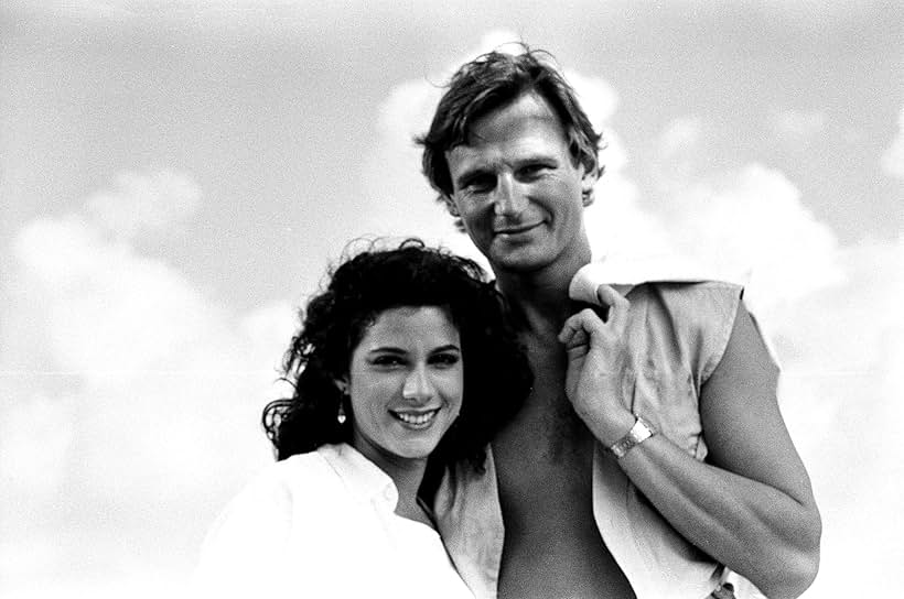 Liam Neeson and Saundra Santiago in Miami Vice (1984)